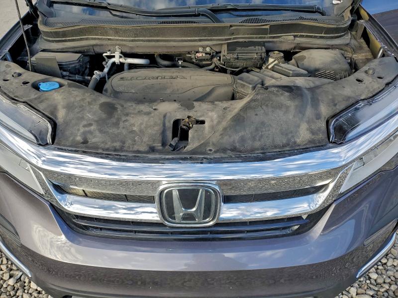 Photo 12 from auction – 2022 HONDA PILOT TOUR with VIN 5FNYF6H61NB018917