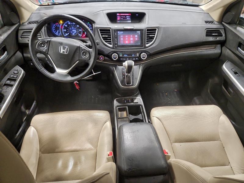 Photo 8 from auction – 2015 HONDA CR-V EXL with VIN 2HKRM4H77FH660679