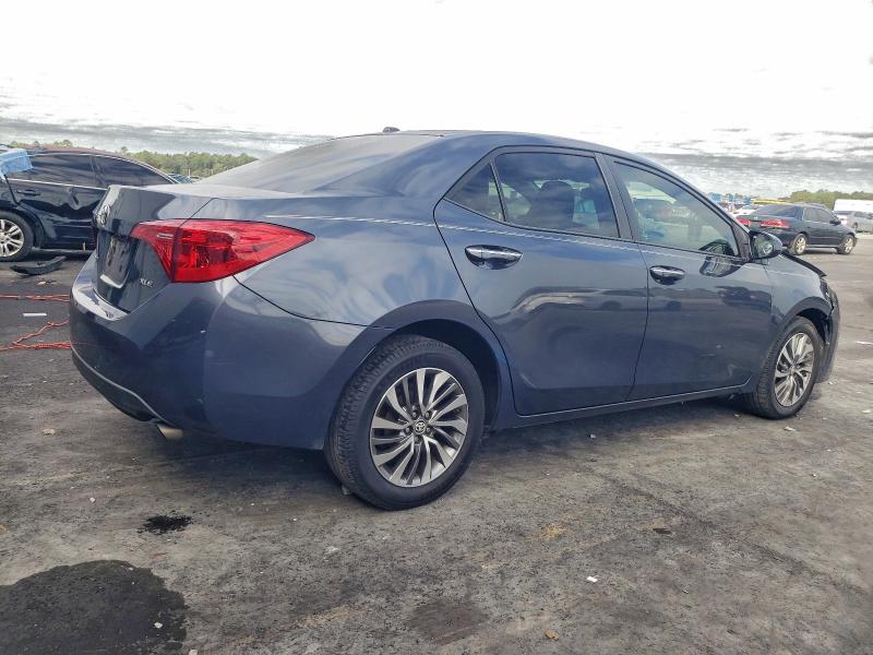 Photo 3 from auction – 2017 TOYOTA COROLLA L with VIN 5YFBURHE2HP680938