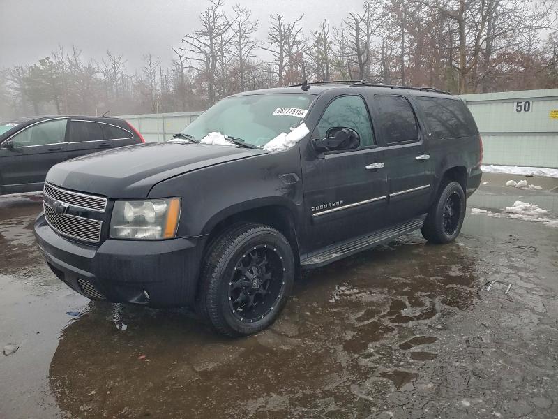 CHEVROLET SUBURBAN 2010 with VIN 1GNUKJE31AR205397 - Photo from auction