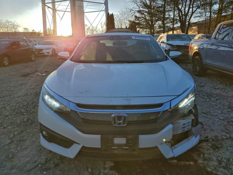 Photo 5 from auction – 2016 HONDA CIVIC TOUR with VIN 2HGFC3B97GH360419