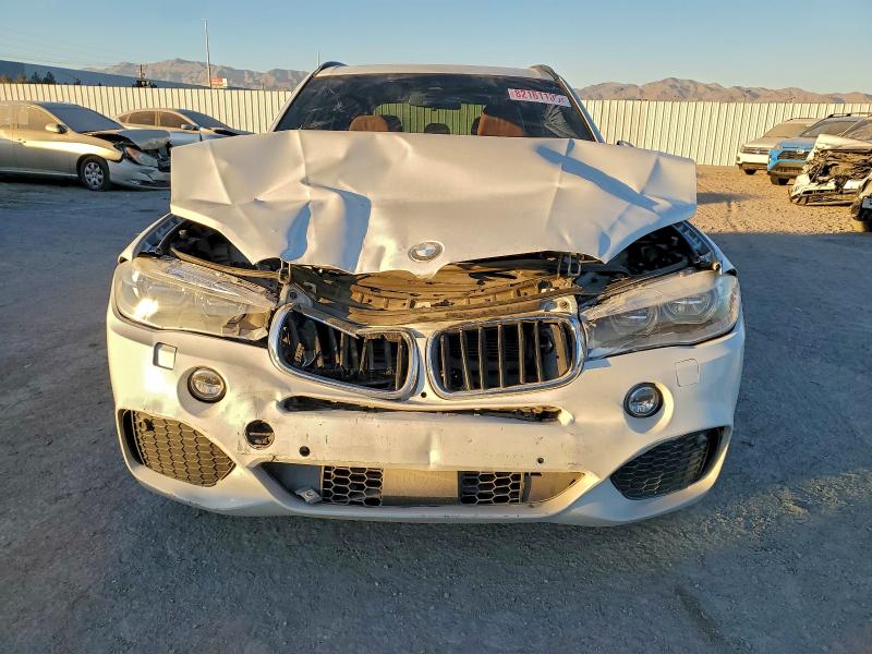 Photo 5 from auction – 2015 BMW X5 XDRIVE3 with VIN 5UXKS4C57F0N08944