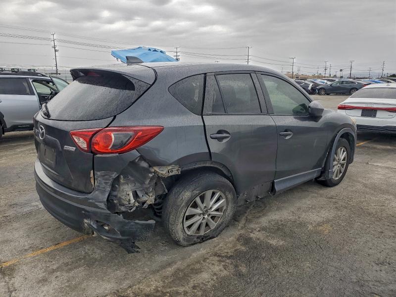 Photo 3 from auction – 2015 MAZDA CX-5 SPORT with VIN JM3KE2BEXF0462175