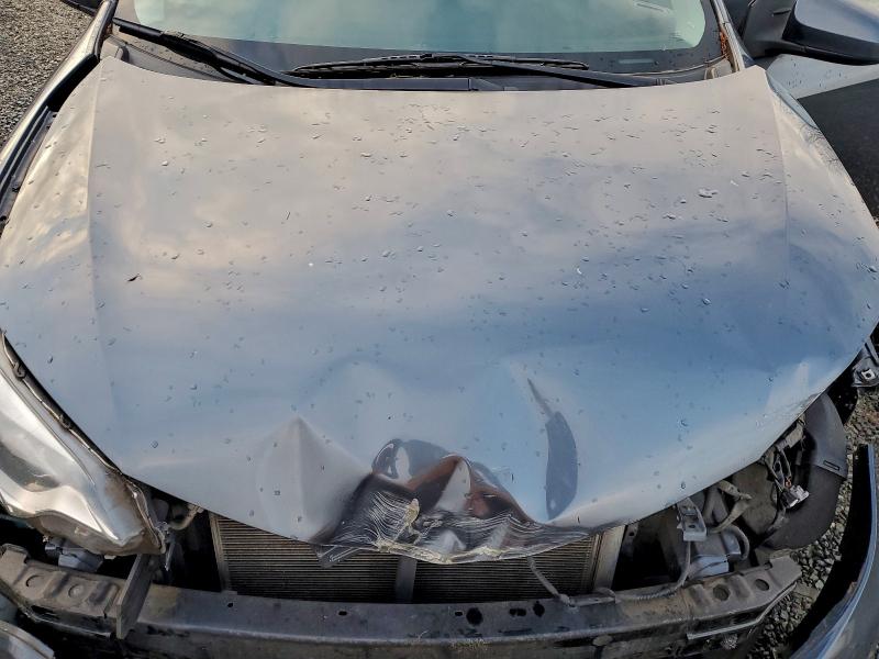 Photo 11 from auction – 2014 TOYOTA COROLLA EC with VIN 2T1BPRHE0EC002885