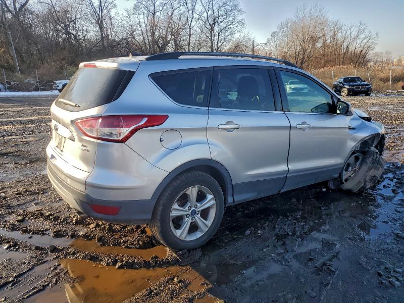 Photo 3 from auction – 2014 FORD ESCAPE SE with VIN 1FMCU9G9XEUE45285