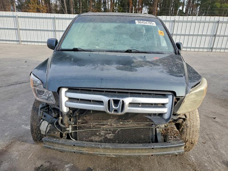 Photo 5 from auction – 2006 HONDA PILOT EX with VIN 5FNYF18546B000553