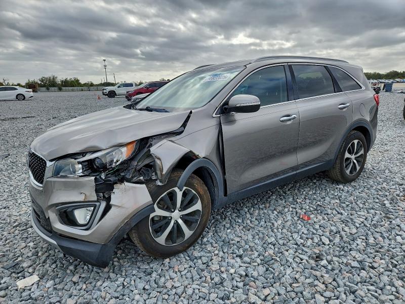 KIA SORENTO EX 2016 with VIN 5XYPH4A1XGG010349 - Photo from auction