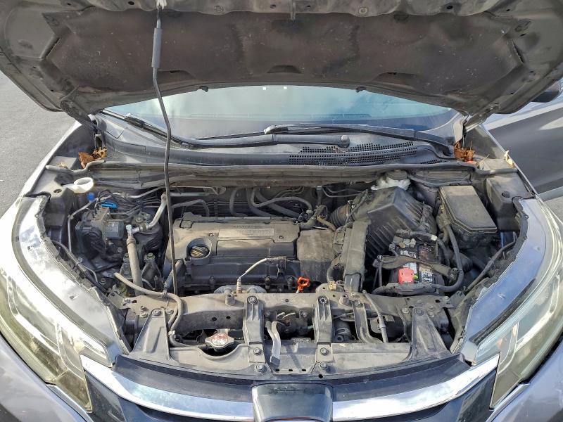 Photo 12 from auction – 2015 HONDA CR-V LX with VIN 5J6RM3H36FL001036