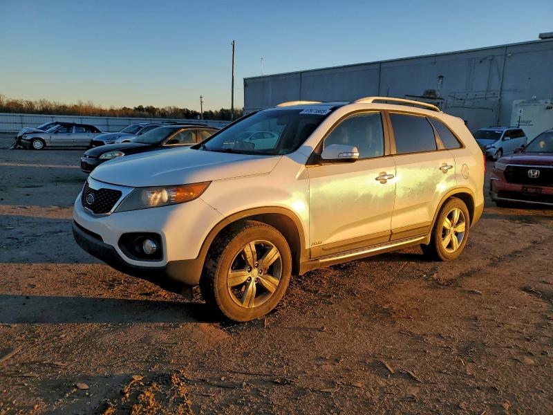 KIA SORENTO EX 2012 with VIN 5XYKUDA25CG211553 - Photo from auction
