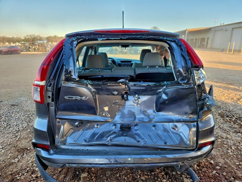 Photo 6 from auction – 2016 HONDA CR-V LX with VIN 2HKRM3H36GH505906
