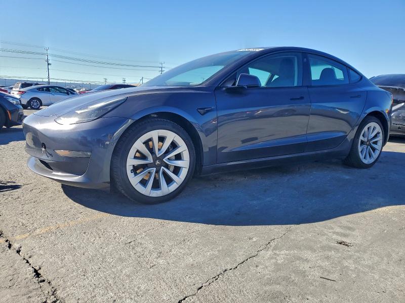 TESLA MODEL 3 2022 with VIN 5YJ3E1EB9NF132181 - Photo from auction