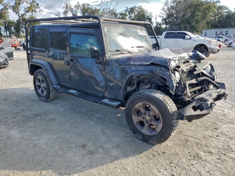 Photo 4 from auction – 2016 JEEP WRANGLER U with VIN 1C4HJWEG0GL287308
