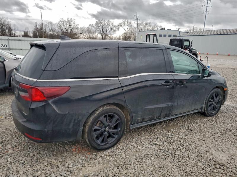 Photo 3 from auction – 2023 HONDA ODYSSEY with VIN 5FNRL6H71PB027786