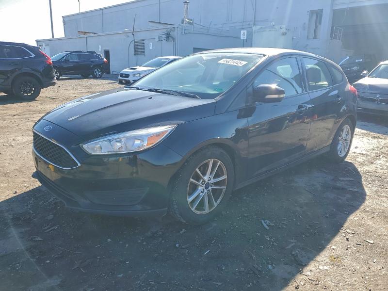 FORD FOCUS SE 2018 with VIN 1FADP3K22JL300089 - Photo from auction