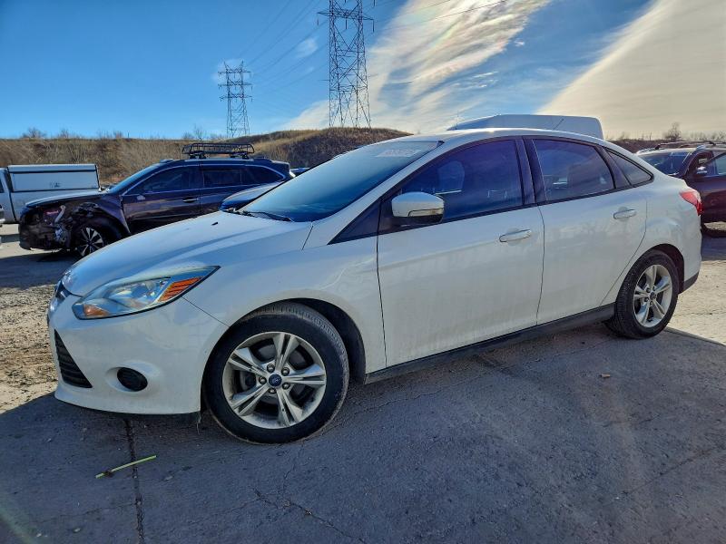 FORD FOCUS 2014 with VIN 1FADP3F25EL461035 - Photo from auction