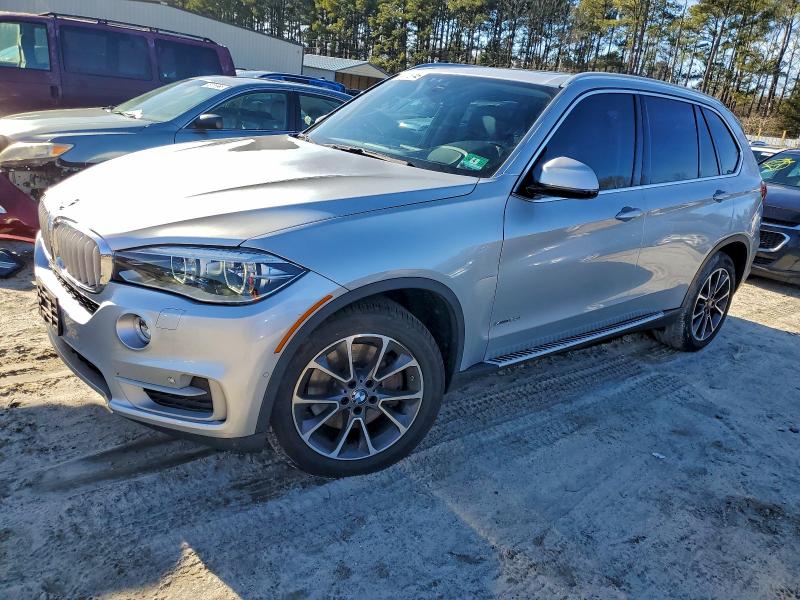 BMW X5 XDRIVE5 2014 with VIN 5UXKR6C53E0C03496 - Photo from auction