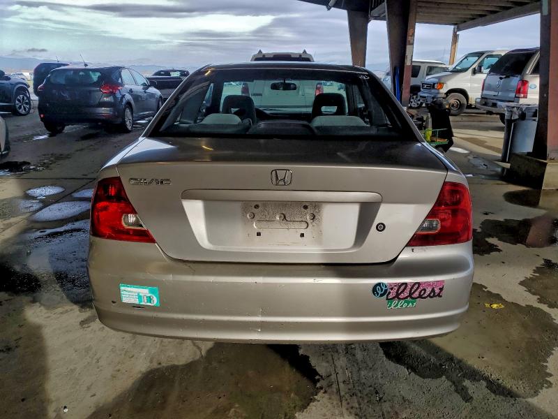 Photo 6 from auction – 2002 HONDA CIVIC LX with VIN 1HGEM22552L006751