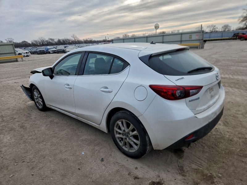 Photo 2 from auction – 2014 MAZDA 3 TOURING with VIN JM1BM1L74E1207603