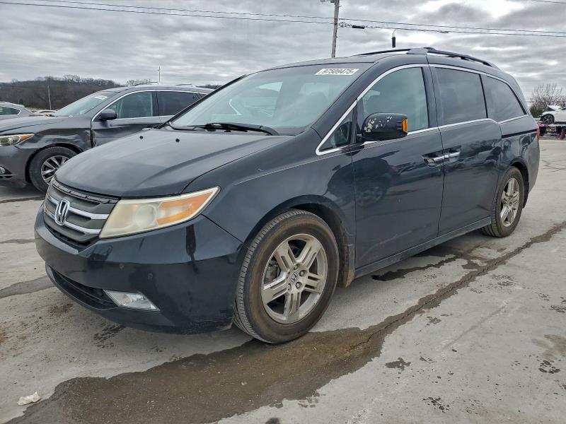 HONDA ODYSSEY TO 2012 with VIN 5FNRL5H93CB008677 - Photo from auction