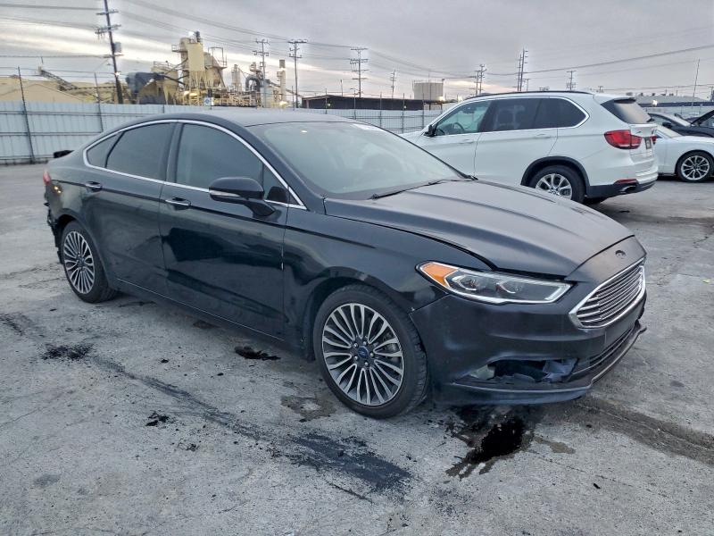 Photo 4 from auction – 2017 FORD FUSION TIT with VIN 3FA6P0SU9HR110648