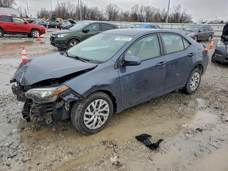 TOYOTA COROLLA L 2017 with VIN 5YFBURHE9HP734655 - Photo from auction