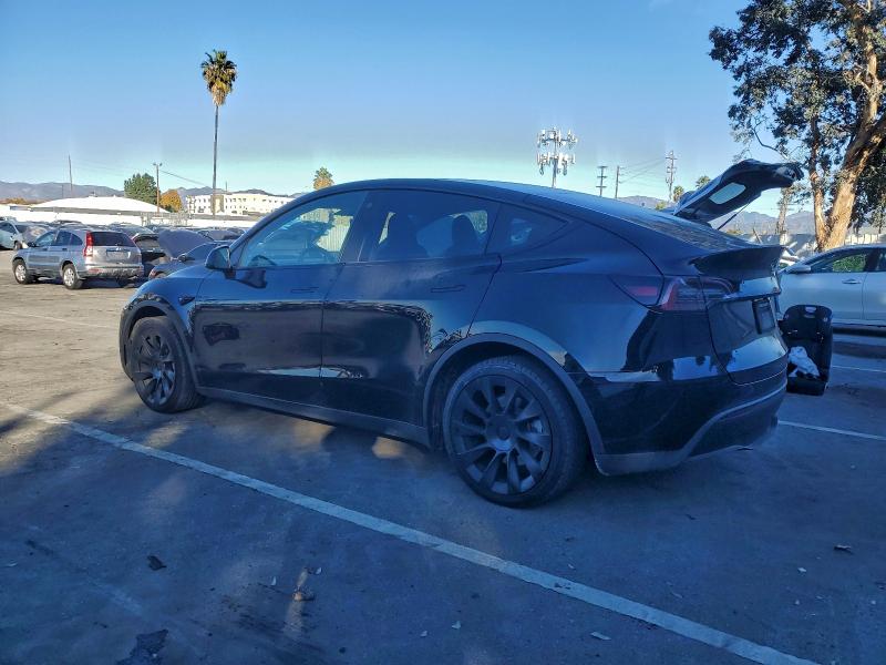 Photo 2 from auction – 2023 TESLA MODEL Y with VIN 7SAYGDEE1PA026824