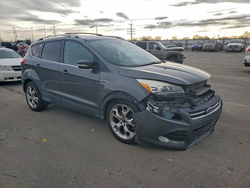 Photo 4 from auction – 2015 FORD ESCAPE TIT with VIN 1FMCU0J99FUA92155