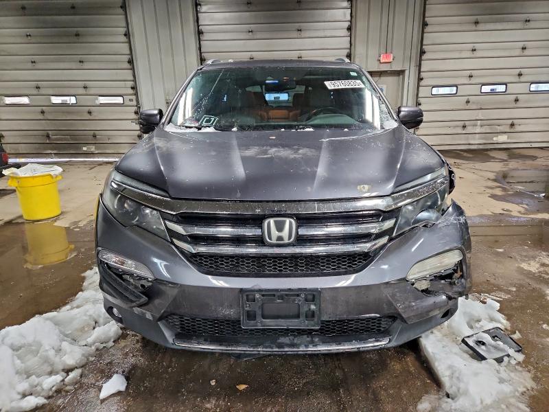 Photo 5 from auction – 2016 HONDA PILOT TOUR with VIN 5FNYF6H95GB003091