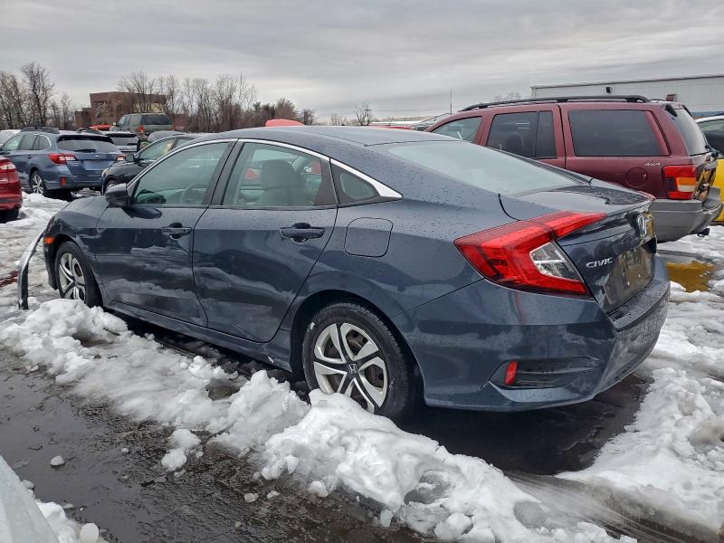 Photo 2 from auction – 2017 HONDA CIVIC LX with VIN 19XFC2F51HE223411