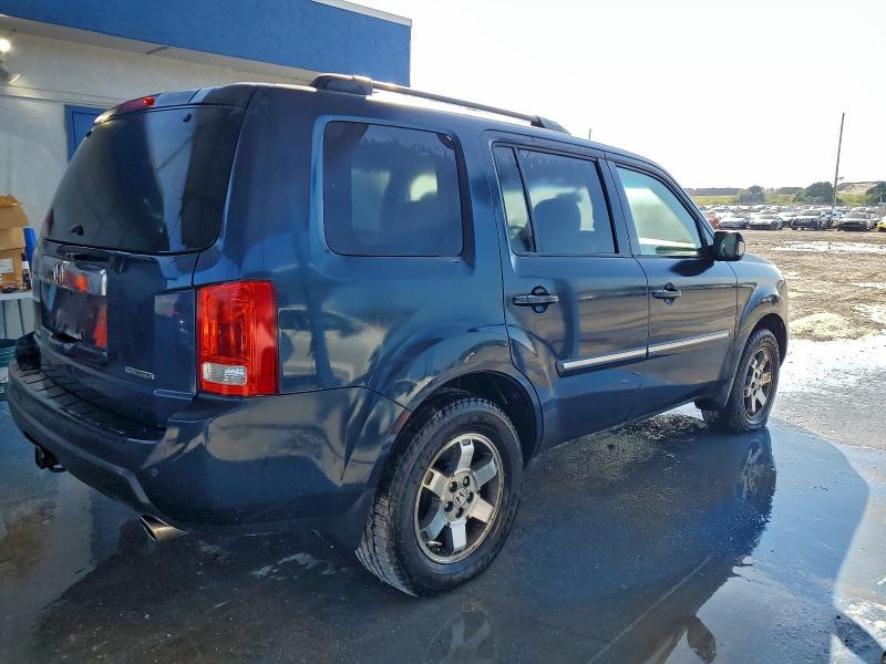 Photo 3 from auction – 2010 HONDA PILOT TOUR with VIN 5FNYF3H99AB014911