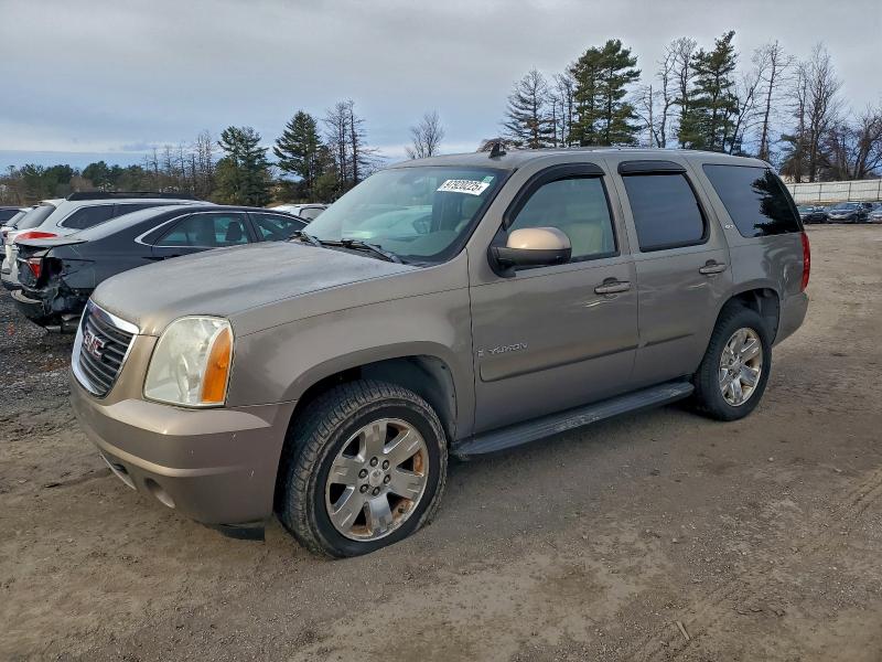GMC YUKON 2007 with VIN 1GKFK130X7J123643 - Photo from auction