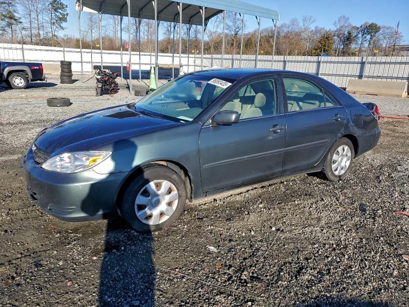 TOYOTA CAMRY LE 2002 with VIN 4T1BE32K82U561385 - Photo from auction