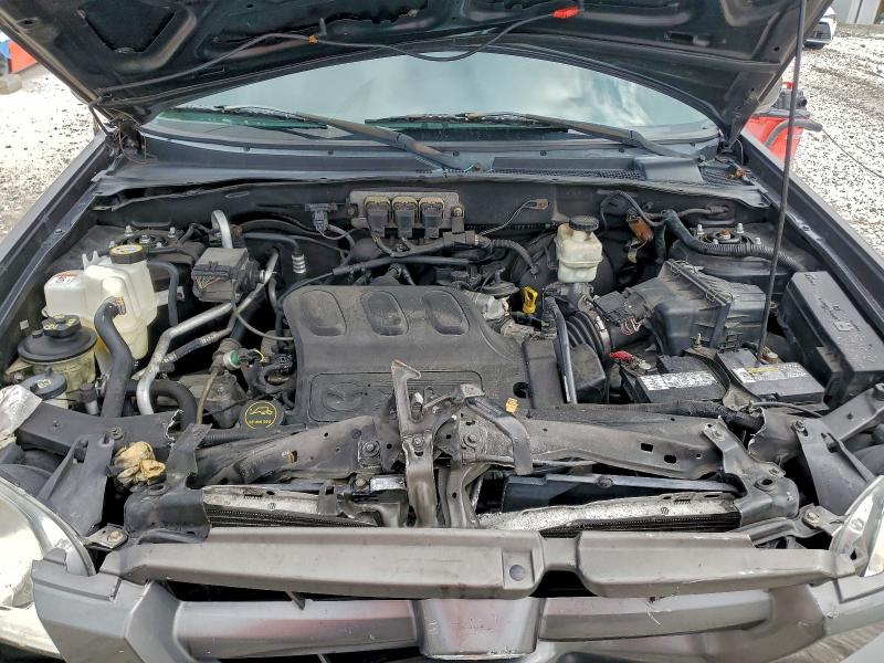 Photo 12 from auction – 2005 MAZDA TRIBUTE with VIN 4F2YZ06165KM49557