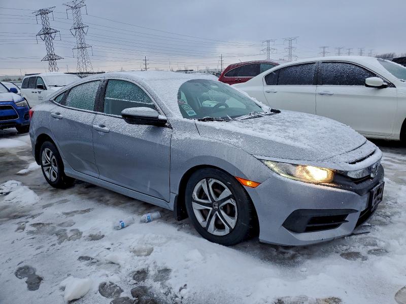 Photo 4 from auction – 2017 HONDA CIVIC LX with VIN 19XFC2F53HE077626