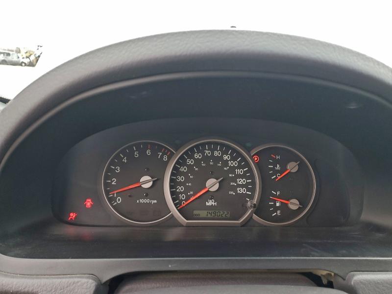 Photo 9 from auction – 2003 KIA SEDONA EX with VIN KNDUP131336464652