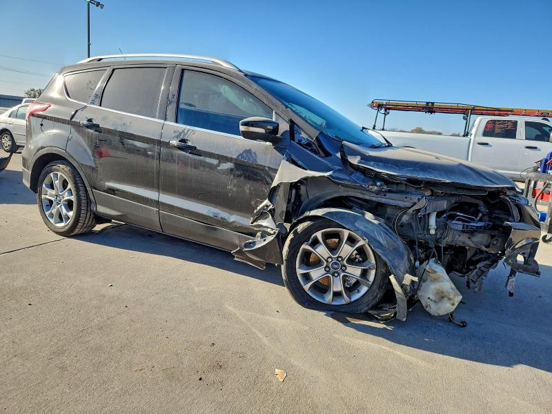 Photo 4 from auction – 2014 FORD ESCAPE TIT with VIN 1FMCU0J97EUE38721