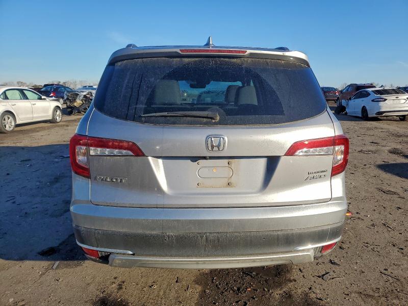 Photo 6 from auction – 2022 HONDA PILOT TOUR with VIN 5FNYF6H65NB062192