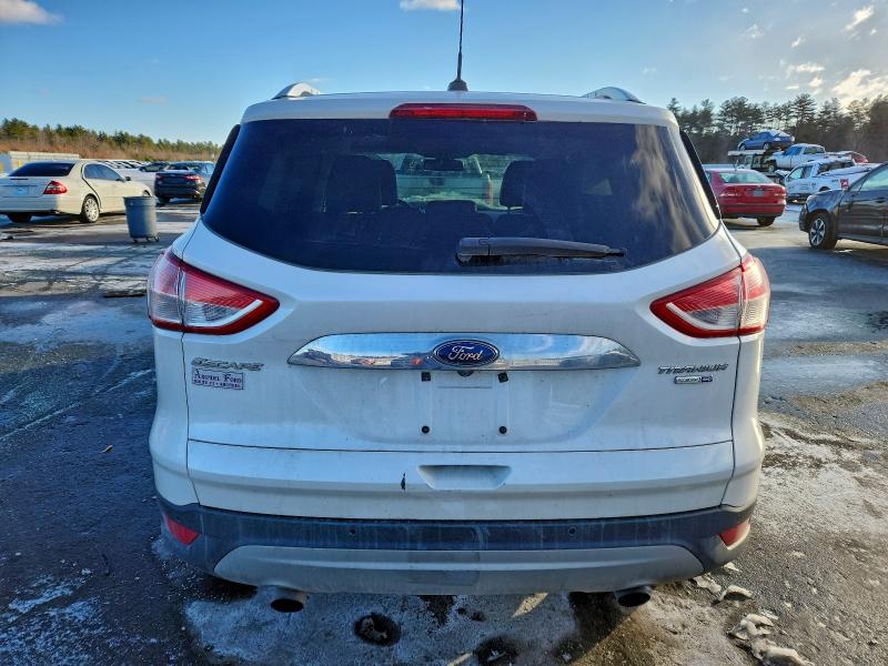 Photo 6 from auction – 2015 FORD ESCAPE TIT with VIN 1FMCU9J92FUA72060