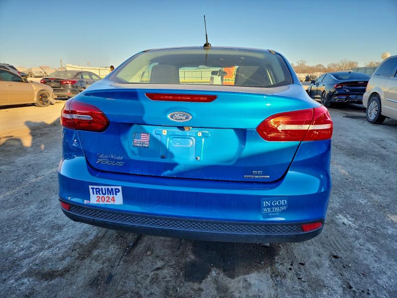 Photo 6 from auction – 2015 FORD FOCUS SE with VIN 1FADP3F23FL239241