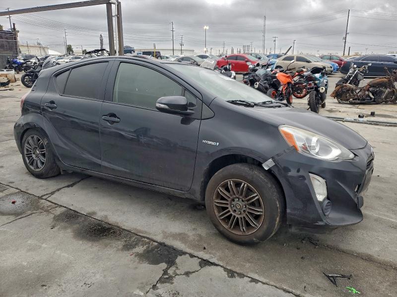 Photo 4 from auction – 2015 TOYOTA PRIUS C with VIN JTDKDTB37F1585345