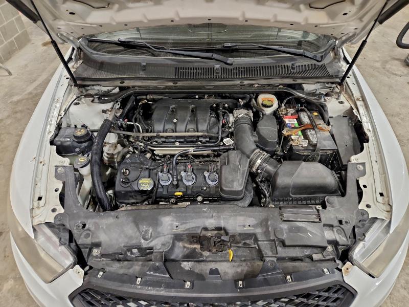 Photo 11 from auction – 2013 FORD TAURUS POL with VIN 1FAHP2M82DG130472