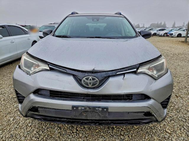 Photo 5 from auction – 2018 TOYOTA RAV4 with VIN JTMZFREV7JJ180104