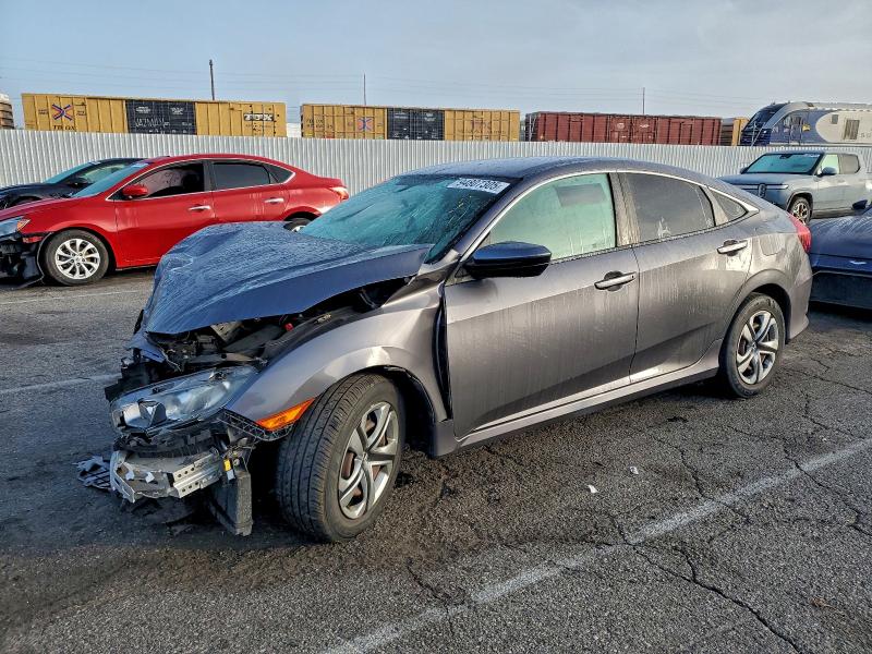 HONDA CIVIC LX 2017 with VIN 2HGFC2F59HH521257 - Photo from auction