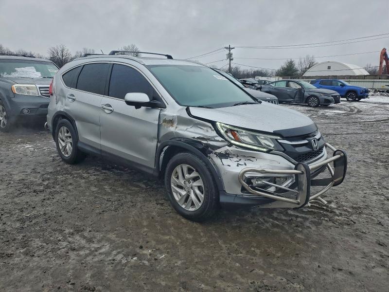Photo 4 from auction – 2015 HONDA CR-V EX with VIN 2HKRM4H51FH657825