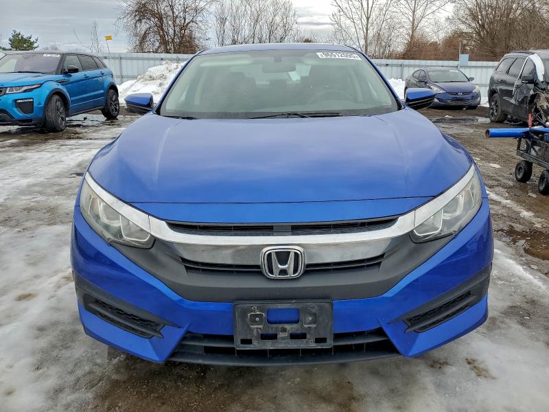 Photo 5 from auction – 2016 HONDA CIVIC EX with VIN 2HGFC2F79GH017257