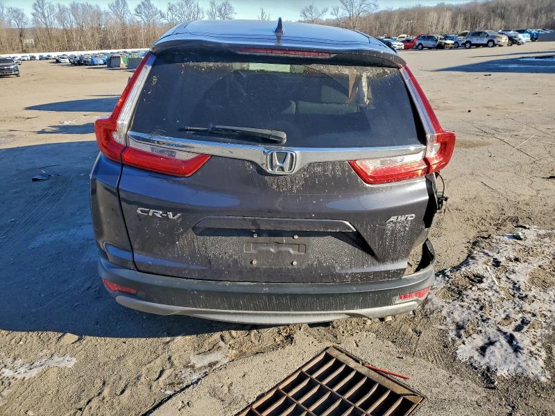 Photo 6 from auction – 2018 HONDA CR-V EX with VIN 7FARW2H58JE077000