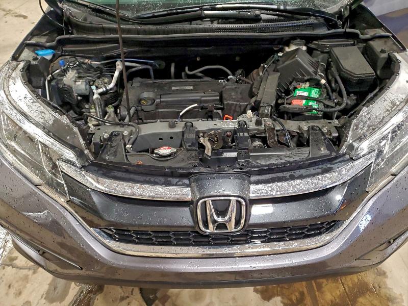 Photo 12 from auction – 2016 HONDA CR-V LX with VIN 2HKRM4H32GH657753