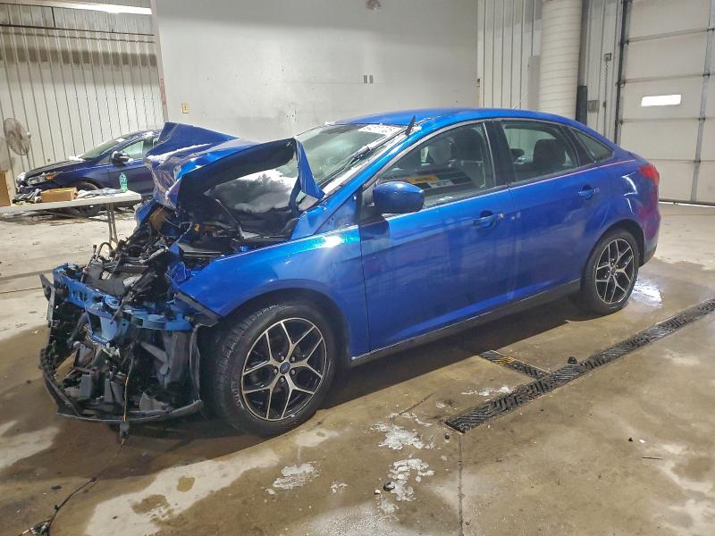 FORD FOCUS SE 2018 with VIN 1FADP3FE5JL201691 - Photo from auction