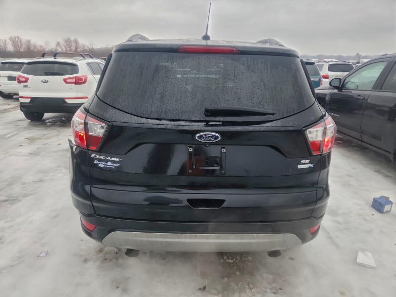 Photo 6 from auction – 2018 FORD ESCAPE SE with VIN 1FMCU9GD4JUC62379