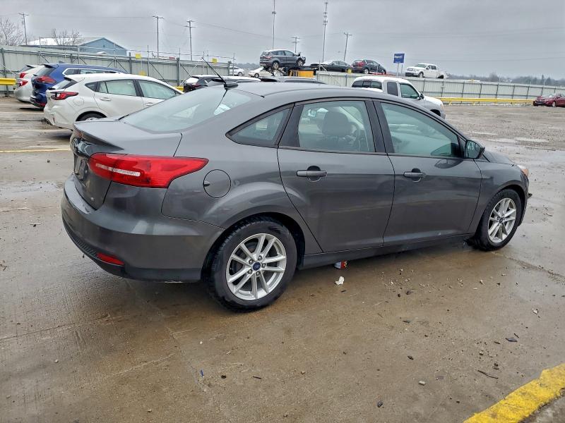 Photo 3 from auction – 2018 FORD FOCUS SE with VIN 1FADP3F21JL328153